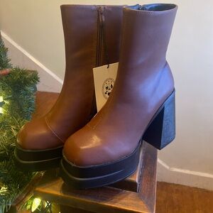 Cider Heeled Ankle Boots

Brown ankle booties with a platform heel. Never worn.